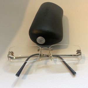 Authentic Chanel rimless eye glasses, inclusive of authentic case made in Italy